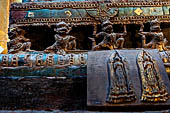 Luang Prabang, Laos - Wat Mai, detail of the Buddha altar inside the sim. 